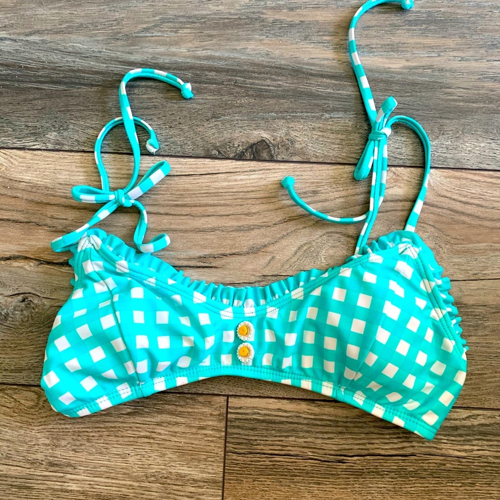 Turquoise gingham bikini top with daisy buttons.